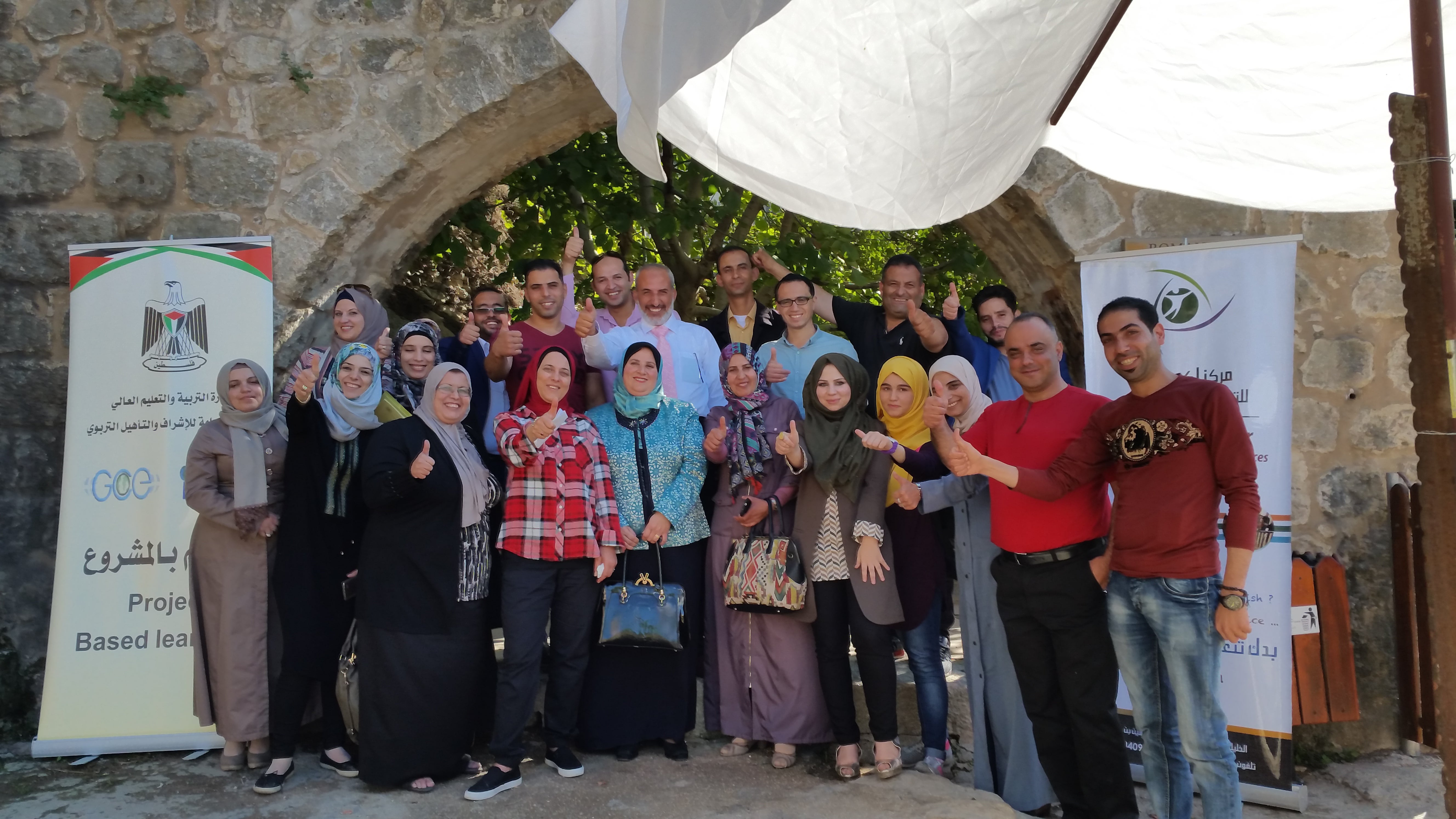 group of participants and facilitators posing