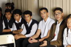 Six students - Fhaed, Saleh, Qaseem, Raas, Yazn, and Sajeeda, sitting down