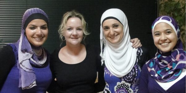Four women posing for a photo