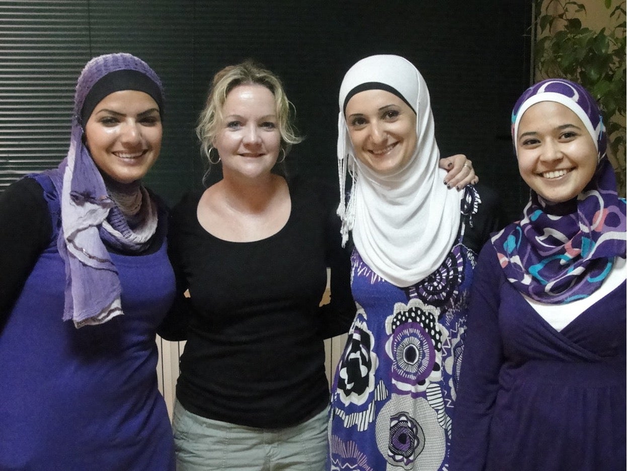 Four women posing for a photo